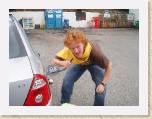 08Aug05 - Andy & Nay Surfing Weekend 002 * Andy trying to syphen out some of the petrol out of the Diesel Car ! Matilda got in on the action as well. * 2272 x 1704 * (885KB)
